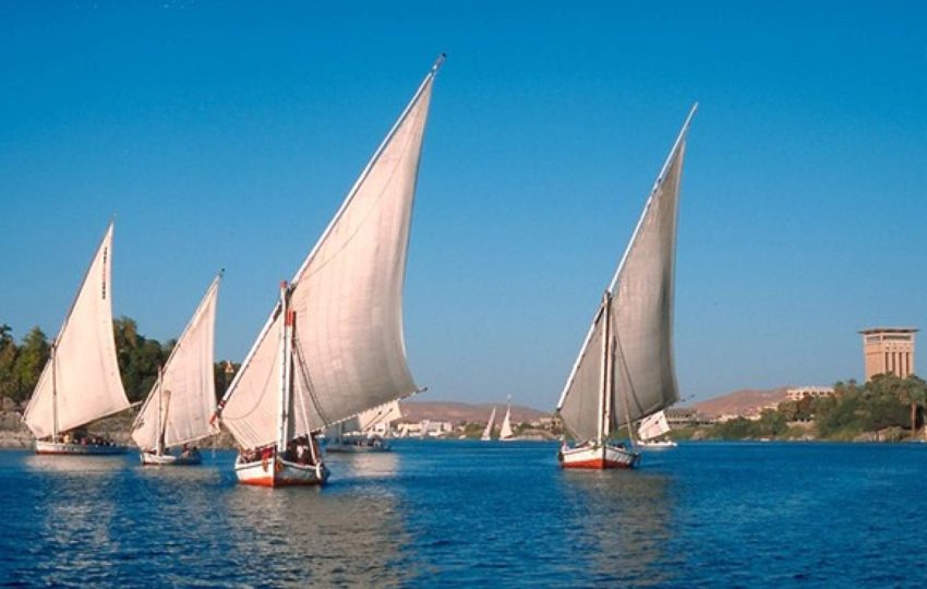 Aswan, Egypt, Nile River, ancient monuments, Nubian culture, desert safaris, Kom Ombo Temple, Philae Temple, Abu Simbel, felucca sail, Nile cruise, botanical gardens.